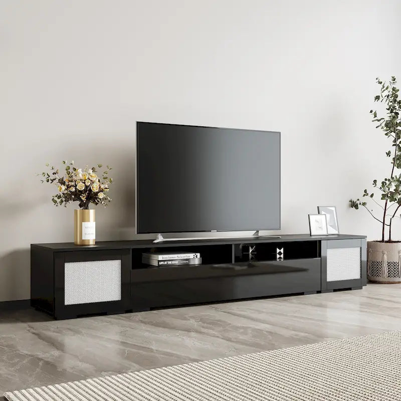 Meuble TV noir avec portes à ouverture par pression et éclairage LED