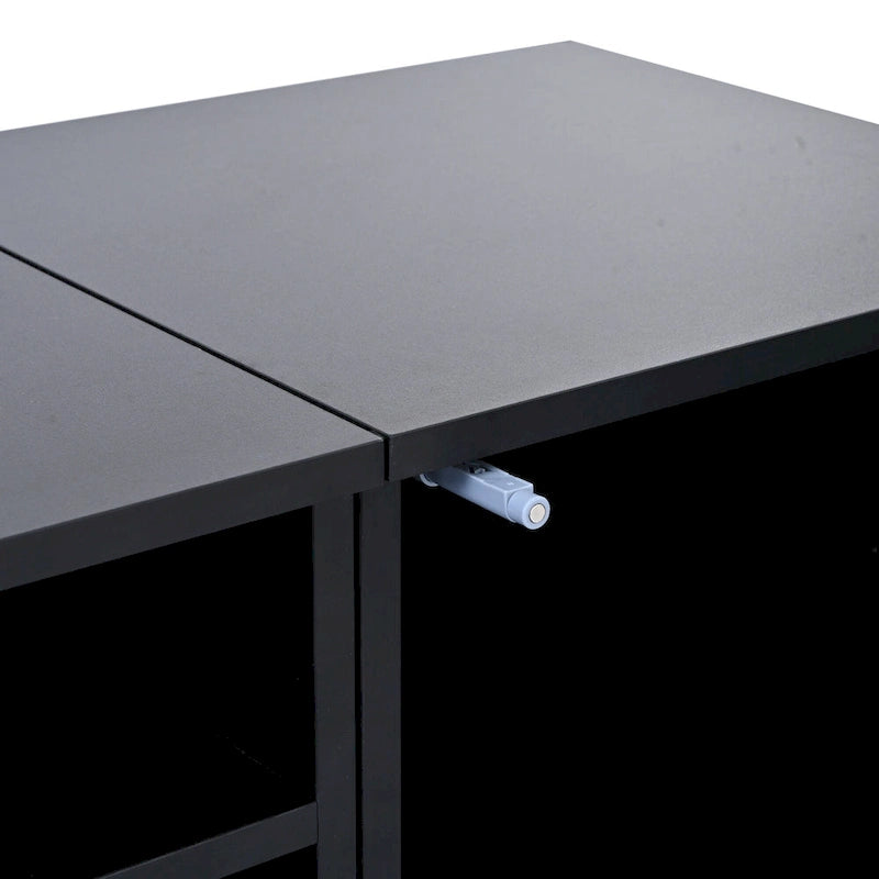 Meuble TV noir avec portes à ouverture par pression et éclairage LED