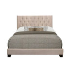 Lit capitonné en tissu beige
